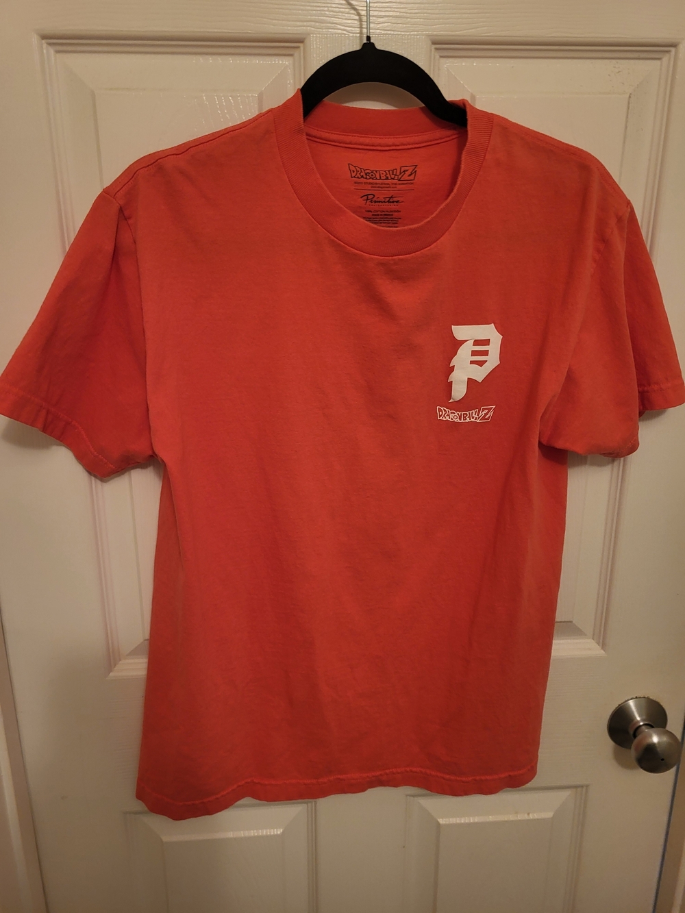 Primitive Orange Short Sleeve Tee with White Chest Logo